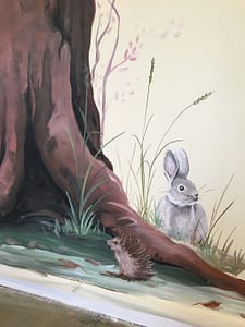 Rabbit and hedgehog woodland mural